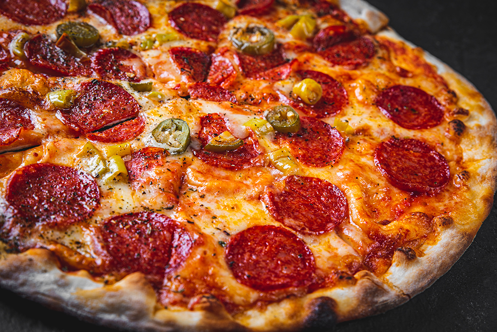 Pepperoni Pizza with Mozzarella cheese, salami, Tomato sauce, pe